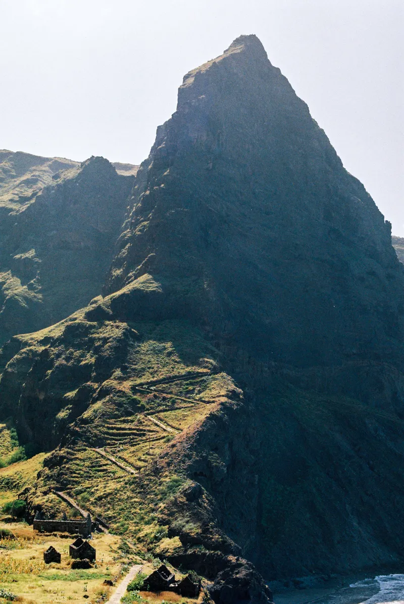 Jagged peak above terraced fields on the coast of Santo Antão, Cape Verde
